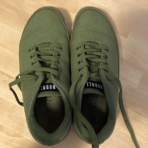 NOBULL canvas trainers.